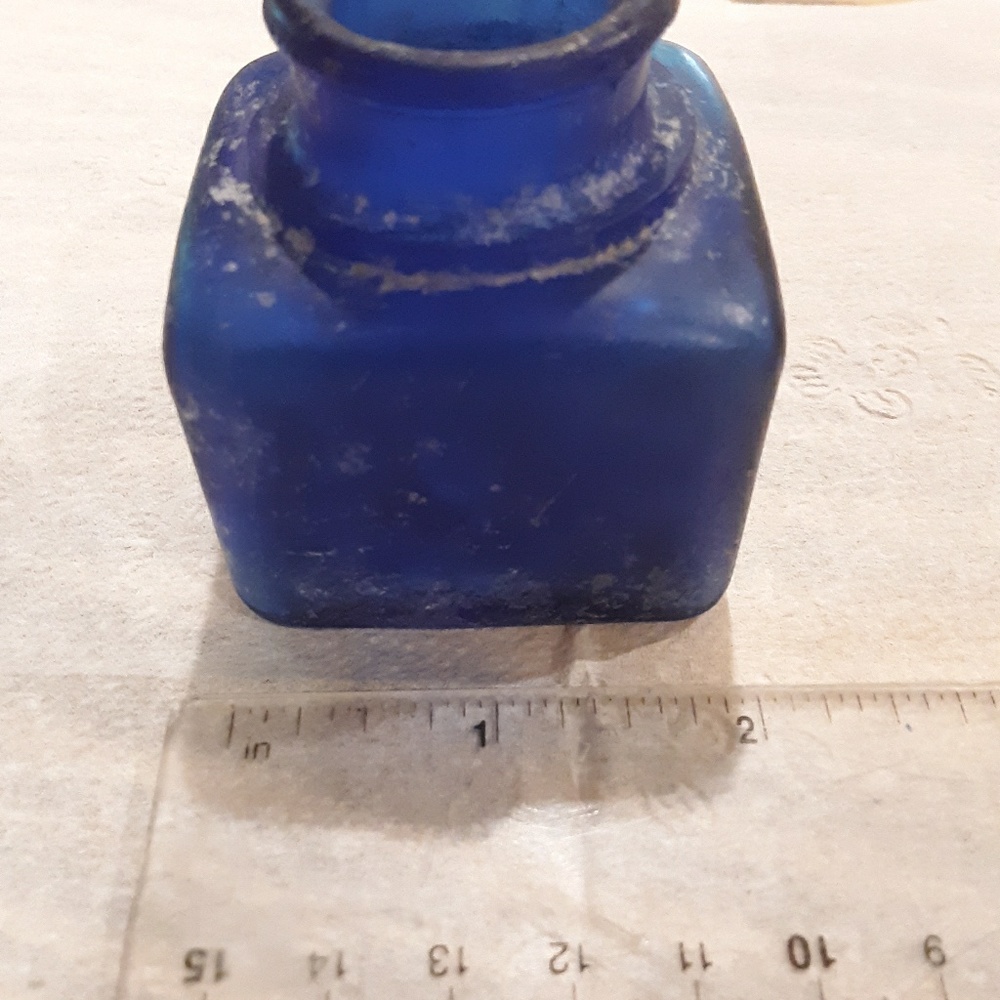 Small blue inkwell bottle